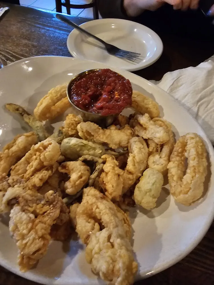 Calamari with Pepperonconi Scallions and Sliced Lemon